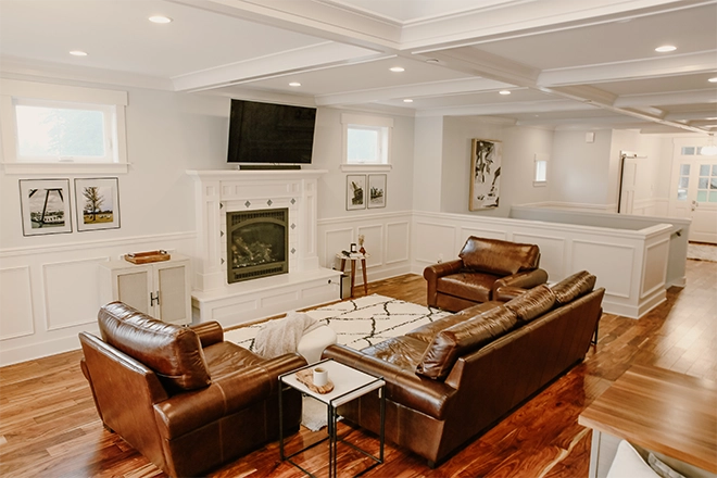 Home design trends present in this room with textured ceilings and comfortable furniture and more