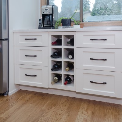 Bothell Kitchen Remodel buffet cabinet wine rack storage white