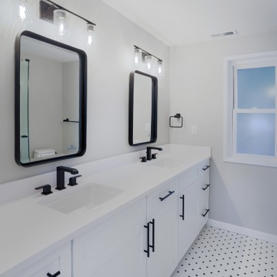 Mill creek vanity sconces design hexagon penny tile bathroom remodel