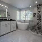 Bathroom with good spacing between the tub and shower and vanity