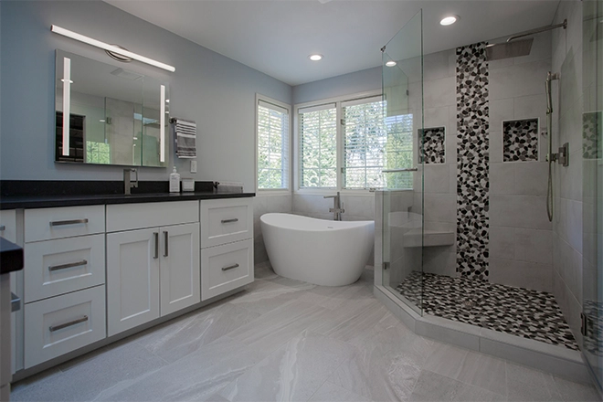 Bathroom with good spacing between the tub and shower and vanity